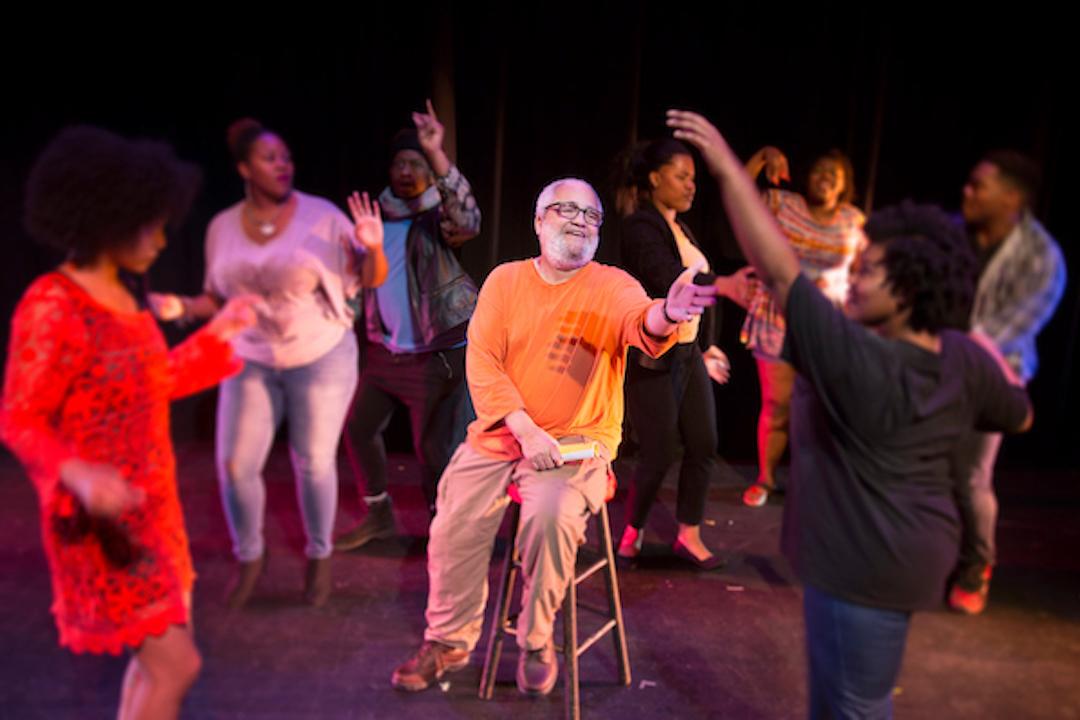 Photo of Johnny Alston directing a student production at North Carolina Central University, where he works part-time after serving as a theater professor for 41 years.
