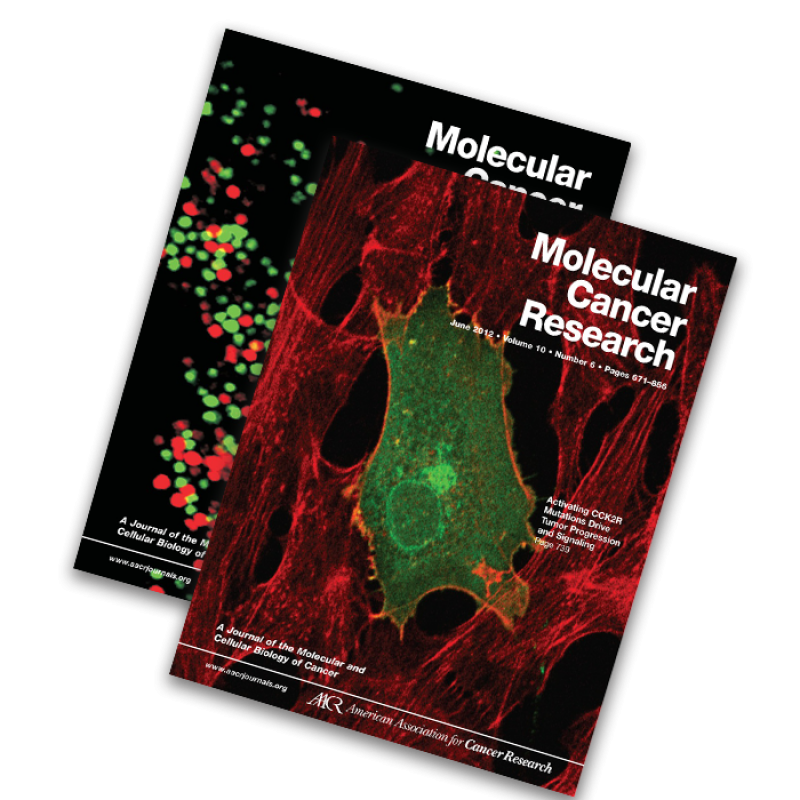 two issues of Molecular Cancer Research with bright red and green covers