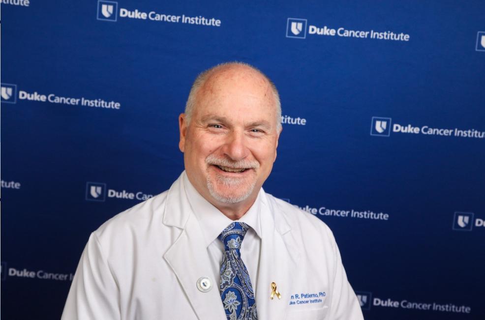 headshot of Steven Patierno with a Duke Cancer Institute banner backdrop
