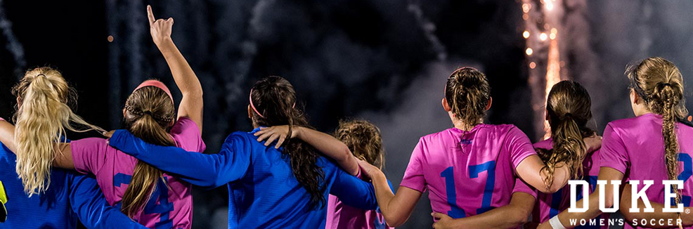 Duke Women's Soccer players link arms during the Kick Cancer Soccer Game.